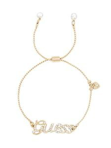 �y���������z�u���X���b�g�@�A�N�Z�T��?�@�S�[���h���C���X�g�[���X�N���v�g���S�u���X���b�g�r�[�Yguess womens gold amp; rhinestone script logo bracelet with charm beads