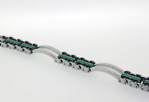 yzuXbg@ANZT?@XeXX`[pluXbgbLX`[2 panel bracelet in stainless steel with green plated steel interlinks