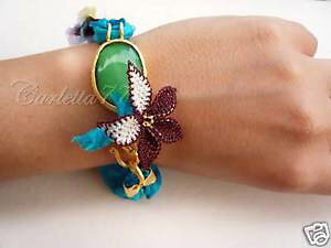 �y���������z�u���X���b�g�@�A�N�Z�T��?�@�u���X���b�gbracelet in silk with gold plated elements, stones, flowers lav crochet