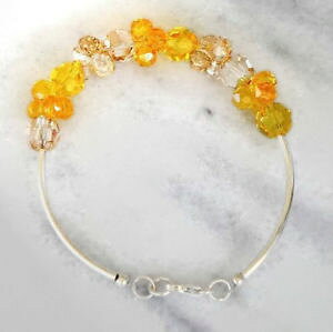 yzuXbg@ANZT?@X^[OVo[XtXL[NX^Cggp[YS[fVhEr[YuXbgsterling silver swarovski crystal light topaz and golden 