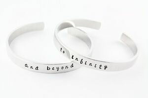 �y���������z�u���X���b�g�@�A�N�Z�T��?�@�X�^���v�A���~�J�t�u���X���b�gto infinity and beyond hand stamped aluminum cuff bracelets