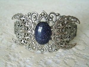 yzuXbg@ANZT?@3JtXuXbgwiccanwiccablue goldstone triple moon cuff bracelet, wiccan pagan wicca witch witchcraft