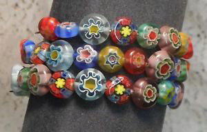 yzuXbg@ANZT?@JtuXbgKXr[Ywraparound cuff bracelet made with 61 glass millefiori beads