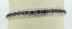 yzuXbg@ANZT?@OX^[OVo[K[lbguXbg231 grams sterling silver 7 18 garnet bracelet q151