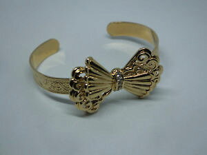 �y���������z�u���X���b�g�@�A�N�Z�T��?�@�J�t�u���X���b�g�S�[���h�g�[���G���{�X�N���A���C�hbeautiful cuff bracelet gold tone embossed bow clear rhinestones 78 wide