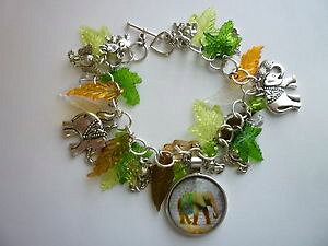yzuXbg@ANZT?@Vo[uXbgs[ibc}EXAN*silver tone charm bracelet elephantspeanutsmouseacrylic leaves