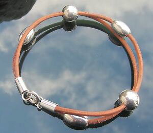 yzuXbg@ANZT?@^U[[Wr[YX^[OVo[NXvR[huXbgtan leather cord bracelet with large beads 925 sterling silver ends and clasp