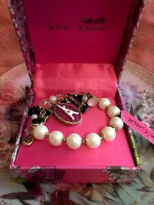 yzuXbg@ANZT?@W\pGbtFuXbgnwt betsey johnson paris is always a good idea sparkly eiffel tower bracelet