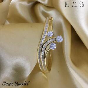 �y���������z�u���X���b�g�@�A�N�Z�T��?�@�n���h���C�h�f�U�C�i�[�J�t�u���X���b�ghandmade high quality artificial designer cz cuff bracelet bv69626