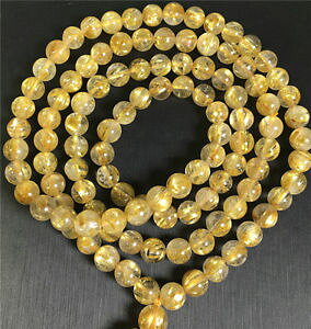 yzuXbg@ANZT?@uXbgS[h``^r[Y}natural crystal bracelet gold rutilated quartz titanium 108 beads 65mm mala