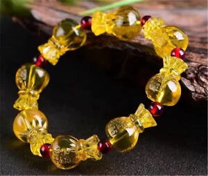 �y���������z�u���X���b�g�@�A�N�Z�T��?�@�o���g�u���X���b�gbaltic amber handcarved golden blue purse bracelet for men and women