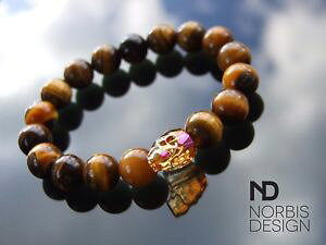 yzC^A@uXbg@YLbcACXJXtXL[NX^uXbgmens tigers eye teschio braccialetto con cristalli swarovski 69 in elasticizzata