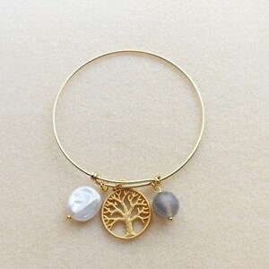 yzC^A@uXbg@p[AK^VtgS[hg[TeJtS[hg[bracciale tono oro con perla agata e albero tono oro satin