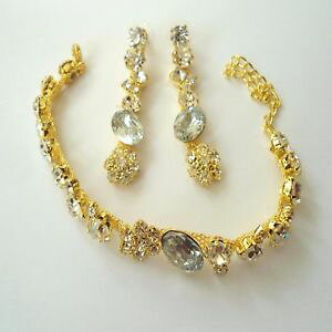 yzC^A@uXbg@uXbgCOS[hJ[parure donna bracciale e orecchini colore oro con zirconi bianchi 158 m