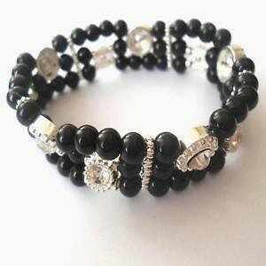 yzC^A@uXbg@[Jtbracciale donna elastico con 3 file di perle nere e zirconi bianchi 199 j
