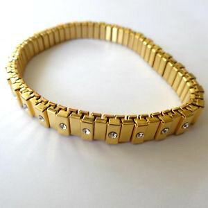 �y���������z�C�^���A���@�u���X���b�g�@�X�e�����X�S�[���h�J�tbracciale elastico donna in acciaio inox colore oro con zirconi 7 mm 215 u