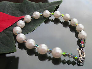 yzC^A@uXbg@GgXtXL[zCgp[X^[OVo[GhobNuXbgelementi swarovski white pearl bracciale con 925 argento sterling estremi