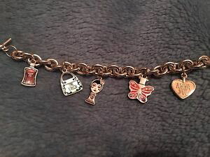 yzC^A@uXbg@AiXCo[uXbganna sui profumo fascino metallo color argento t bar bracciale