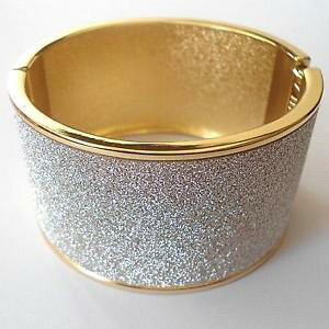 yzC^A@uXbg@JtWbhS[hbracciale donna rigido alla schiava c oro con brillantini bianchi 132 j