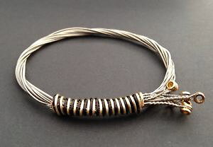 yzC^A@uXbg@p[tbgM^[TCNJtlimited edition chitarra elettrica riciclato bracciale stringa con stringhe piatto ferita