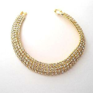 yzC^A@uXbg@JtejXJ[S[hzCgbracciale donna tennis colore oro con 4 file di zirconi bianchi 19 cm 92 h