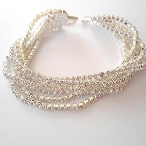 yzC^A@uXbg@JtejXVo[zCgbracciale donna tennis colore argento 7 file di zirconi bianchi 19,5 cm 72 m