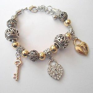 yzC^A@uXbg@JtVo[S[hy_gL[n[gy_gbracciale donna c argento rame oro ciondoli cuore chiave pendenti, zirconi 61 l