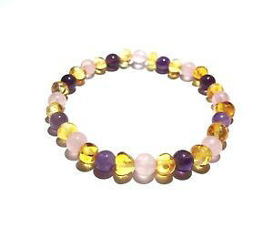yzC^A@uXbg@^nj[og[YNH[cuXbgIWXgb`adulto tara miele baltic amber rose quartz gemstone stretch bracciale love ambra