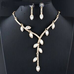 yzANZT[@lbNXRA[XtXL[gXyAgcollier boucles doreilles swarovski elements transparents feuilles dores