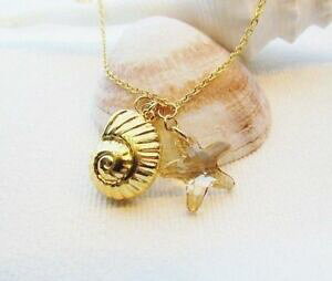 yzANZT[@lbNX`F[S[fVFr[`V[X^[XtXL[NX^uEx[Wcadenaen la playa concha dorado estrella de mar swarovski cristal marrn beige