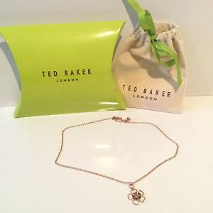 yzANZT[@lbNXebhx[J[t[lbNXsNS[hg[en caja ted baker collar de flores fiesta tono oro rosa
