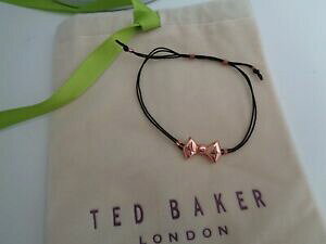 yzANZT[@lbNXebhx[J[S[hsN{ER[huXbglote ted baker rosa oro arco amistad pulsera de cordn negro