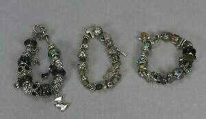yzANZT[@lbNXuXbgKXr[YVo[J[yMGWFNXZbgconjunto de tres pulseras perlas de vidrio 925 plata pingino coche perro cruz angel