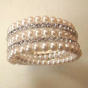yzANZT[@lbNXpbht@Cp[rALbracciale donna elastico 5 file perle bianche e zirconi bianchi 108 c