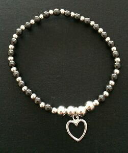 yzANZT[@lbNXX^[OVo[w}^Cgr[YSuXbgVo[n[gplata esterlina y hematites con cuentas pulsera elstica con corazn de plata encanto