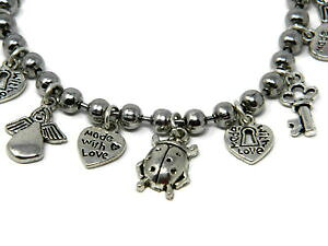 yzANZT[@lbNXfBy_gtH[bracciali charms con ciondoli in ottone di varie forme