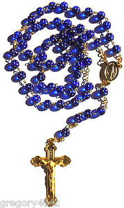 yzANZT[@lbNXGg[chapelet etoile perles de verre couleur bleu sur chaine doree