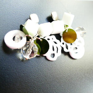 yzANZT[@lbNXCOCOr[}bgVo[statement aretes pendientes plata mate con blanco flor y kristal catia levy