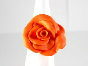 yzANZT[@lbNX@[YIWbague avec une rose orange dore rglable