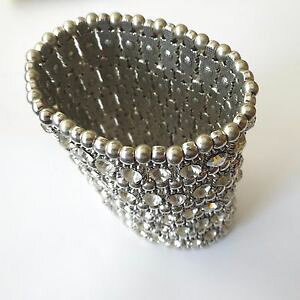 yzANZT[@lbNX@zCgX[uJ[Jtbracciale alla schiava colore argento elastico 5 file di zirconi bianchi 65 q