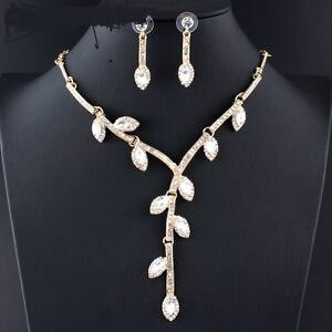 yzANZT[@lbNX@RA[XtXL[gXyAgcollier boucles doreilles swarovski elements transparents feuilles dores