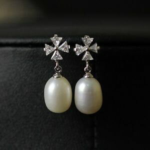 yzANZT[@lbNX@sp[zCghbvVo[COorecchini a perno perla di coltura bianca goccia argento 925 fiore quadrifoglio