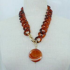 yzANZT[@lbNX@`F[vLVKXAK^lbNXcollana con catena plexiglass tartarugato e agata