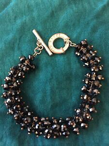 yzANZT[@lbNX@ebhx[J[IWiobOJtubNr[Yted baker splendido bracciale cordone nero con borsa originale