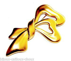 yzANZT[@lbNX@l`[tu[`monet grosse broche couleur or motif noeud bijou brooch