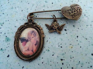 yzANZT[@lbNX@J{Vt@Gbroche pingle cabochon ange raphael