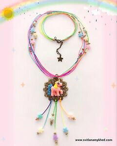 yzANZT[@lbNX@RA[A[NAVGTeuYcollier licorne arcenciel unicorne etoiles cordon satin estampe bronze