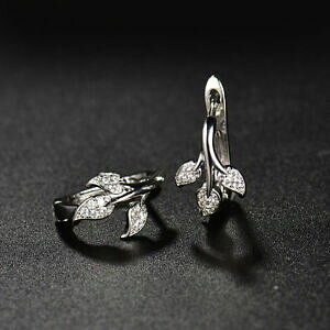 yzANZT[@lbNX@zCgS[hCOCtgp[YTt@CAc[ktabbraccino orecchini oro bianco 18 kt immerso albero della vita topazio cerchio bianco zaffi