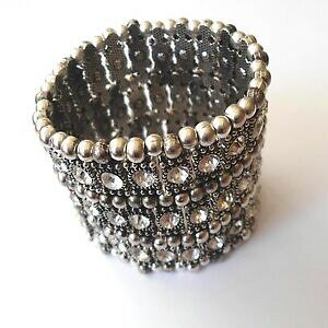 yzANZT[@lbNX@X[uJ[Jtbracciale alla schiava colore argento elastico 3 file di zirconi bianchi 131 d