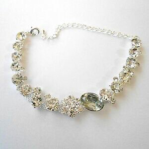 yzANZT[@lbNX@Jtgbracciale donna retr colore argento anticato con cristalli bianchi 14 m